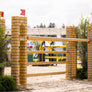 tan castle pillar horse jump standards