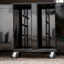 tack locker with adjustable saddle racks