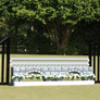 Arched Stone Hunter Wall from Dalman Jump Co. with Aluminum Picketed Wing Standards, Hunter Gate, and Flower Boxes