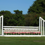 Aluminum Picketed Wing Standards with Stone Wall, Ladder Style Gate, and Flower Boxes