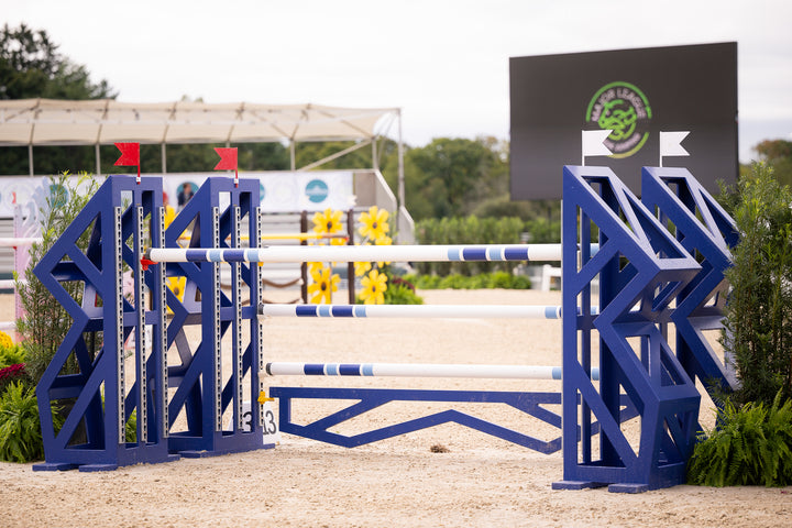 geometric blue horse jump standards at the horse show