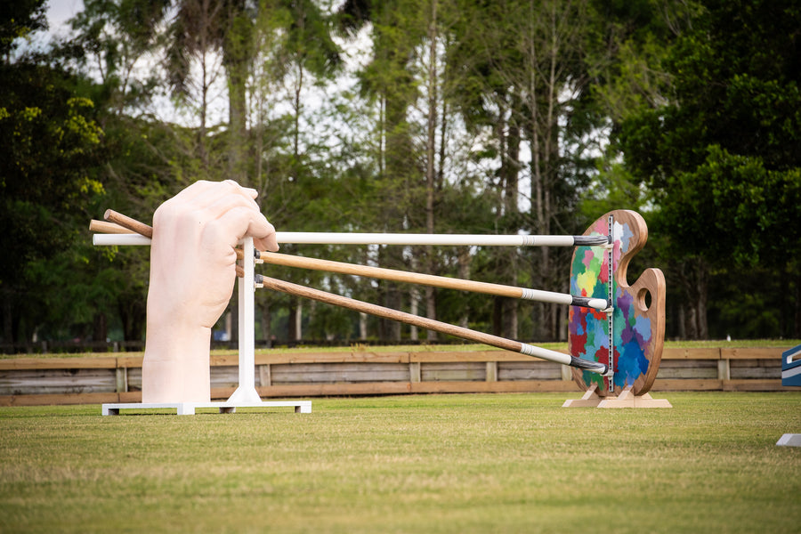 giant painting hand horse jump