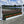 Aluminum Picketed Wing Standards with Ladder style Gate, Turf Wall, and Flower Boxes
